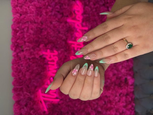 Mint French with pink 3D florals and rhinestones nails at Modish Nail Lounge Rancho Cucamonga