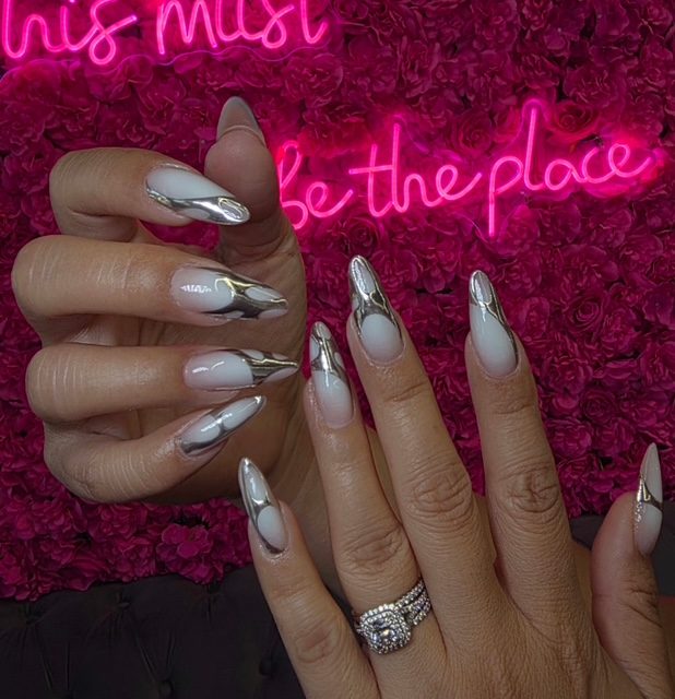 Milky white with liquid silver-chrome drip nails at Modish Nail Lounge Rancho Cucamonga