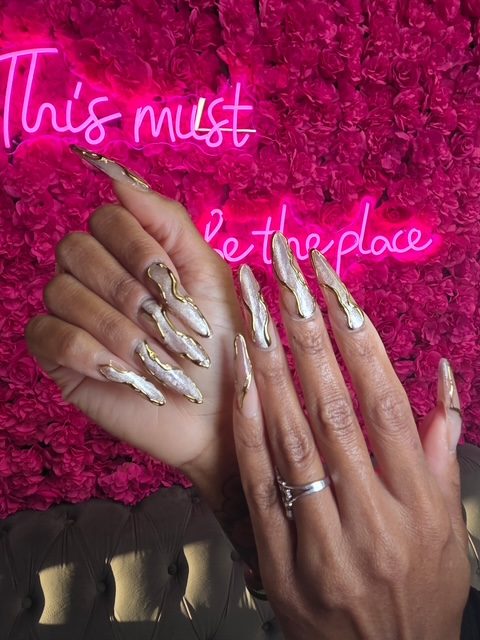 Pearl white with molten-gold vein framing nails at Modish Nail Lounge Rancho Cucamonga