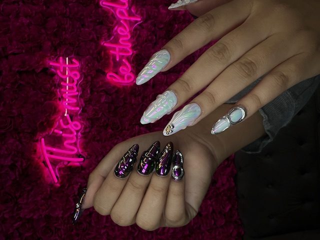 Oil-slick black-purple paired with opal iridescent nails at Modish Nail Lounge Rancho Cucamonga