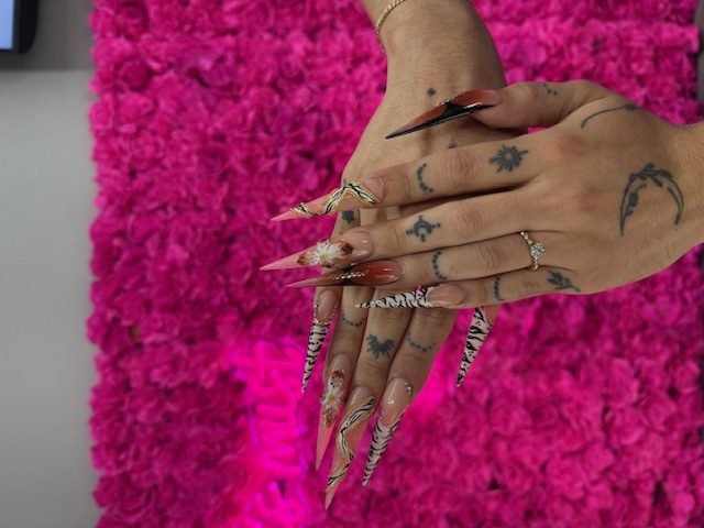 Zebra French with 3D flower and gold tones nails at Modish Nail Lounge Rancho Cucamonga