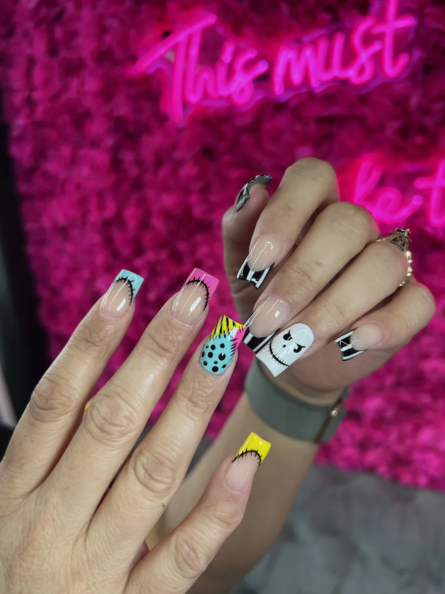 Pastel patchwork with stitched French and character art nails at Modish Nail Lounge Rancho Cucamonga