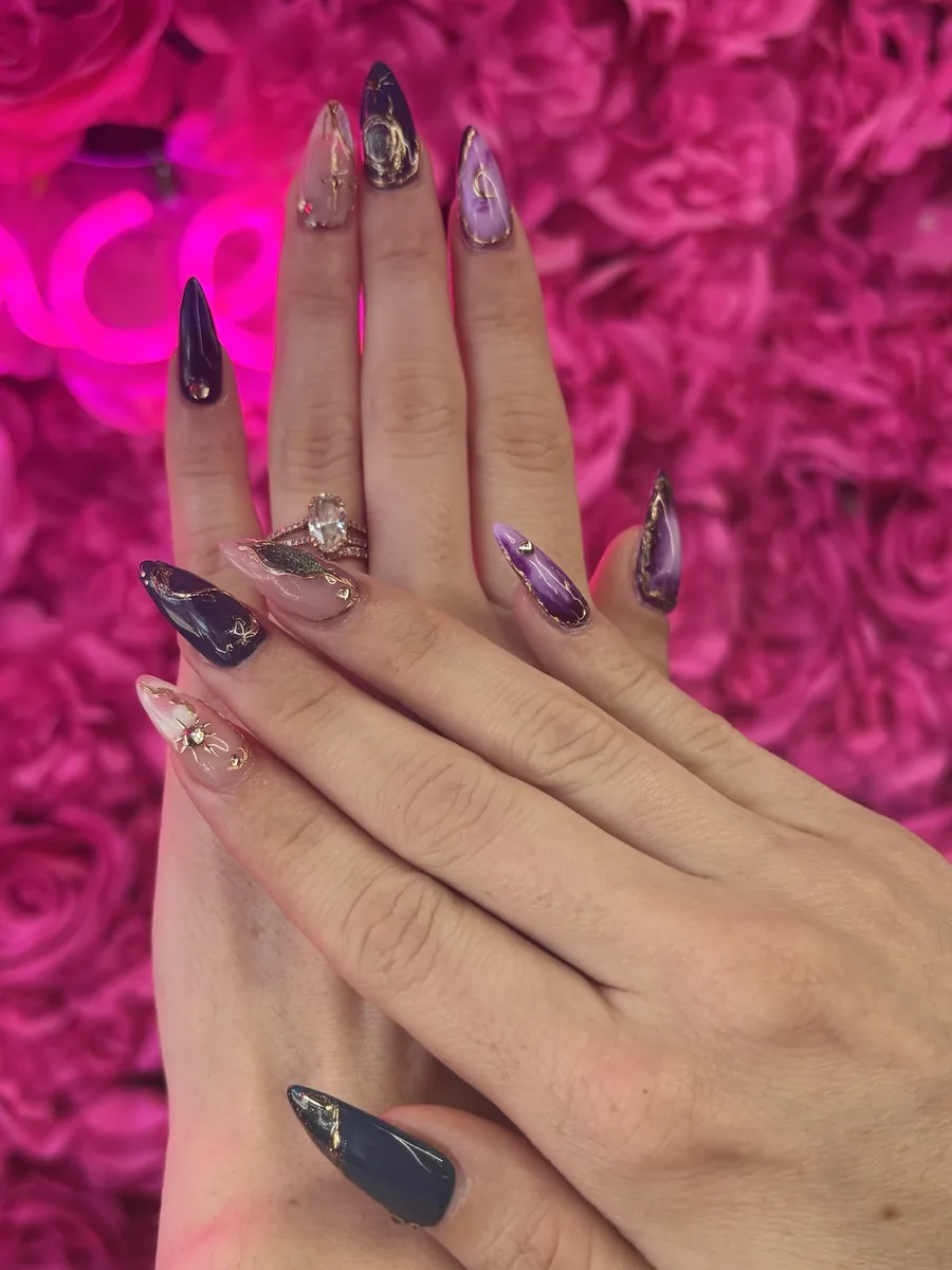 Deep plum marble with silver chrome accents nails at Modish Nail Lounge Rancho Cucamonga