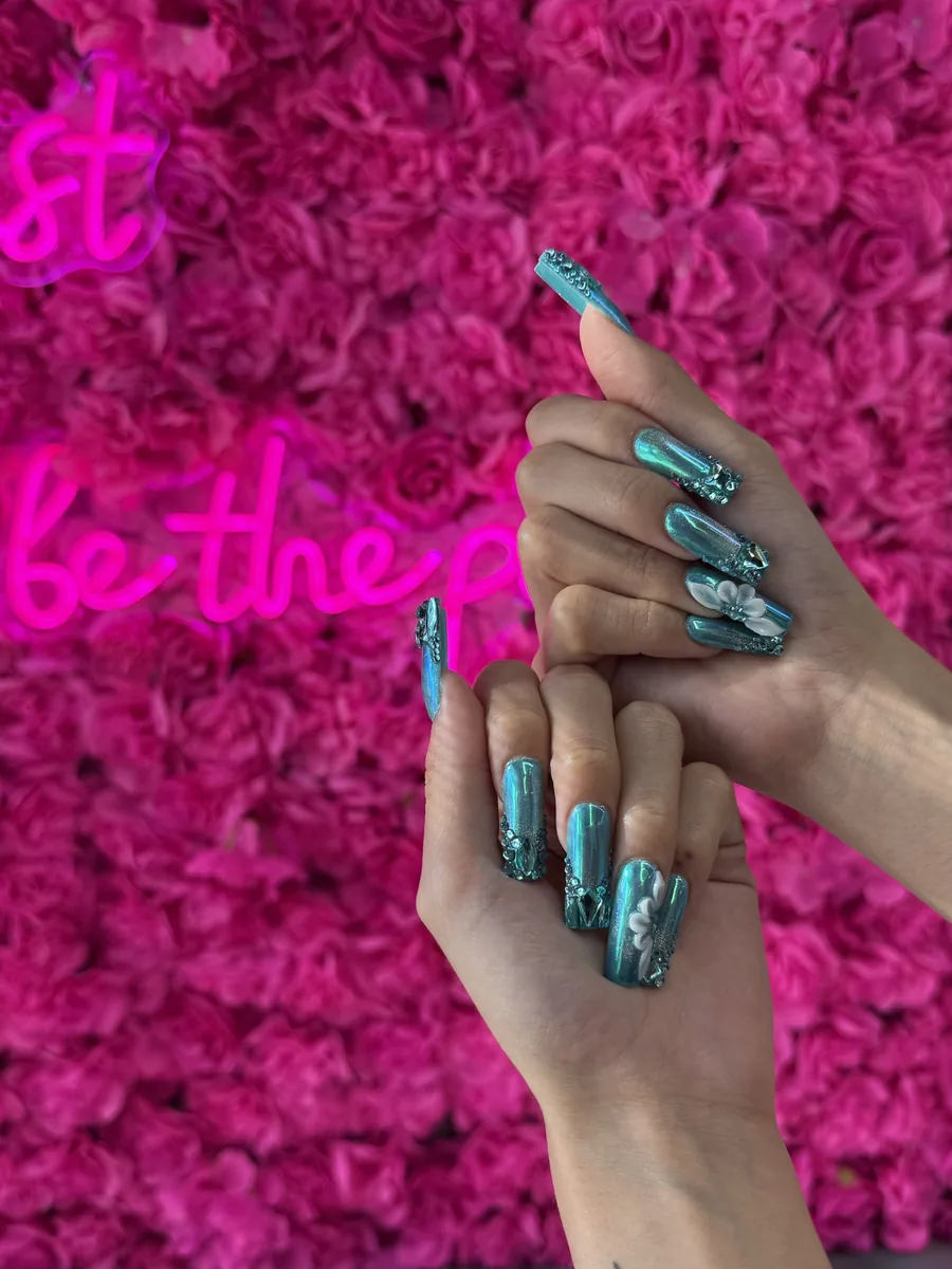 Aqua chrome coffin with glitter accents nails at Modish Nail Lounge Rancho Cucamonga