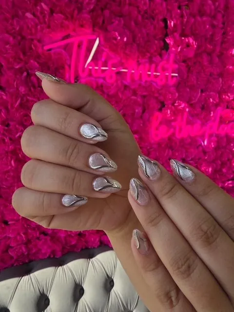 Black leopard print nails at Modish Nail Lounge Rancho Cucamonga