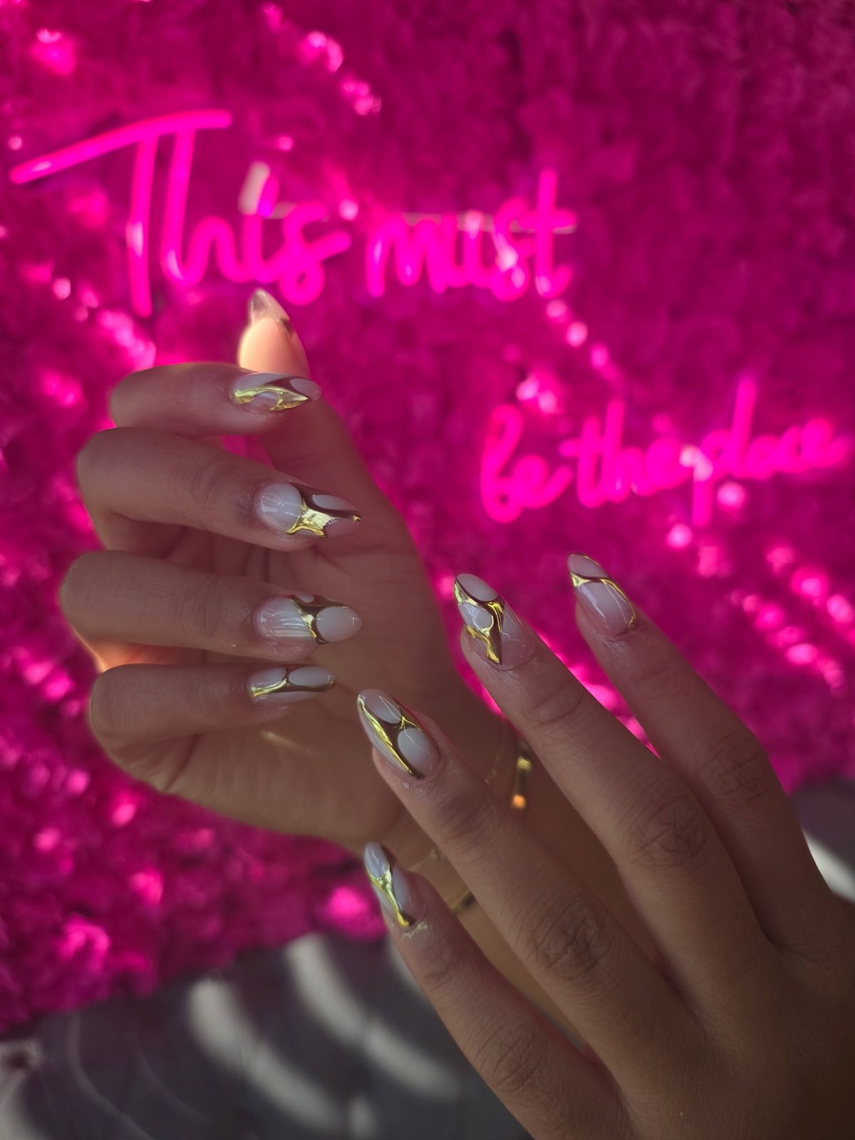 Gold swirl nails at Modish Nail Lounge Rancho Cucamonga