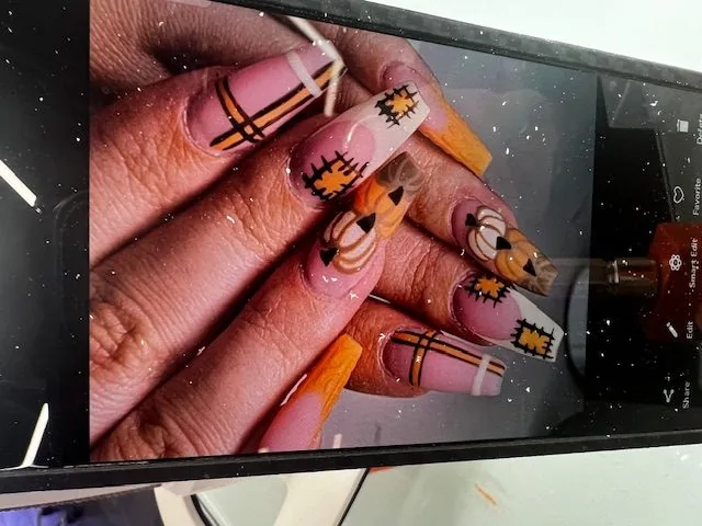 Pink French swirl nails at Modish Nail Lounge Rancho Cucamonga